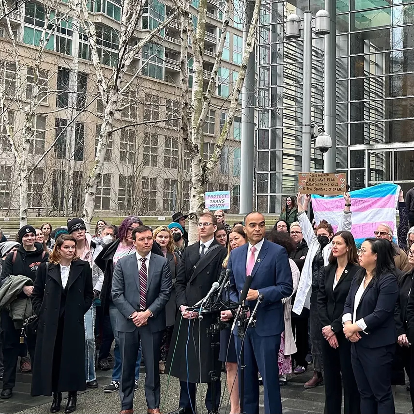 Danni with Attorney General Nick Brown outside the courthouse, February 2025